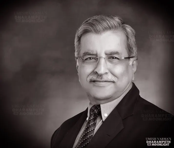 Monochrome portrait of a senior gentleman in a suit