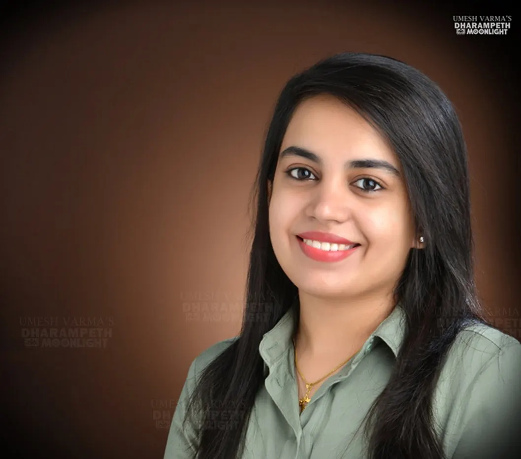Professional headshot of a smiling woman